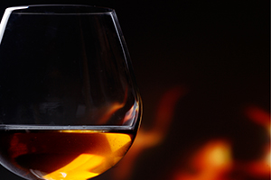 Glass of cognac with mood lighting