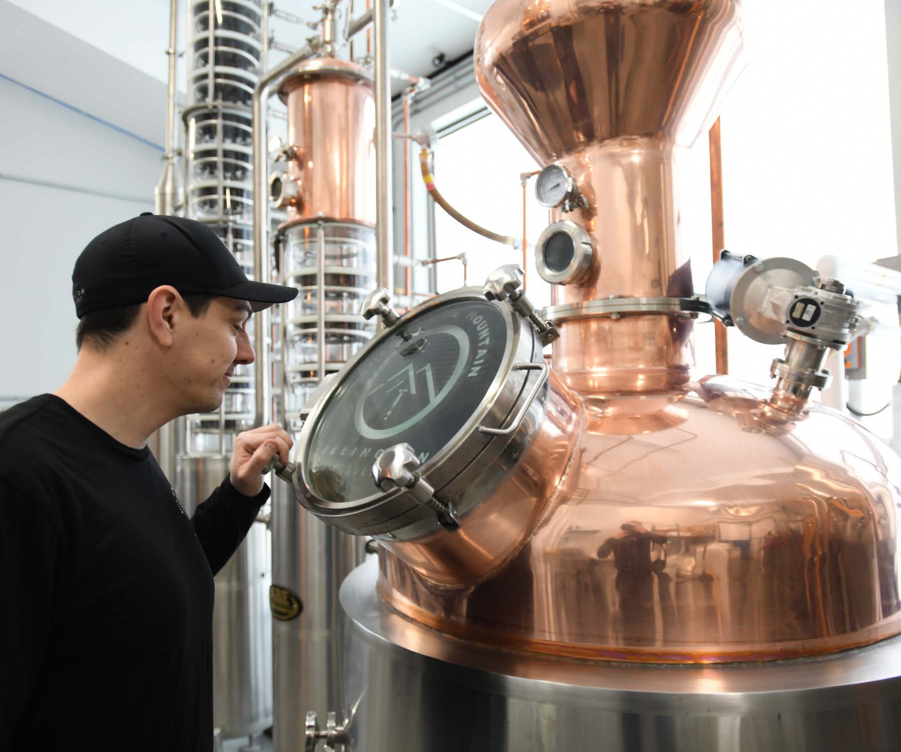 Ryan Bremser, Head Distiller, monitors his work on another special spirit blend at Killington Distillery.