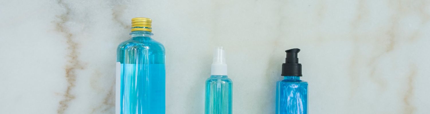 blue bottles of hand sanitizer 