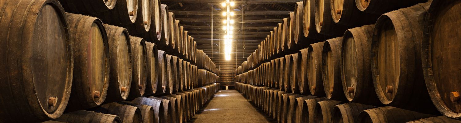 wine barrels in long hallway