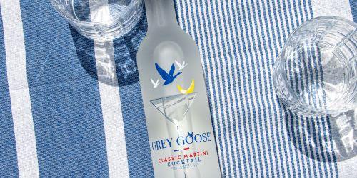 Bootle of greygoose on a blue and white striped towle