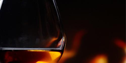 Glass of cognac with mood lighting