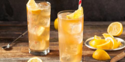 Tall drinks with a lemon garnish